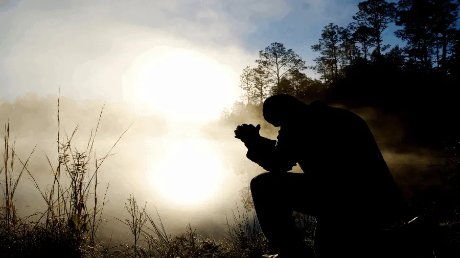 Praying Near Water And Light