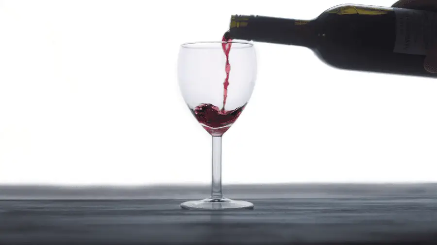 Wine Poured In Glass 900x506