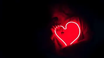 Heart Glowing In Front Of Person 356x200