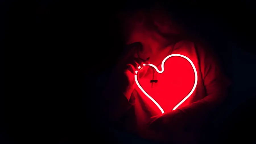 Heart Glowing In Front Of Person 900x506