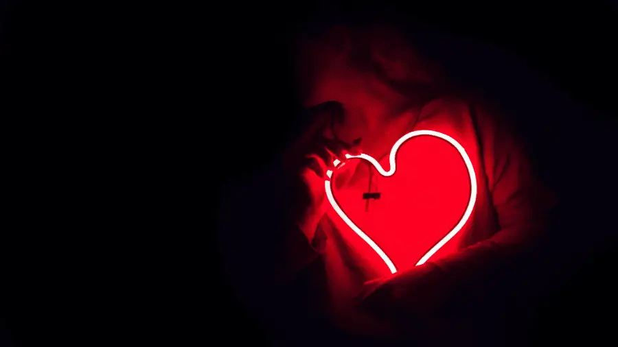 Heart Glowing In Front Of Person 900x506