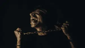 Person Bound By Chains & Can't See 356x200