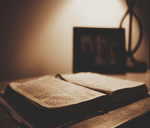 Bible On Desk With Lamp 300x256