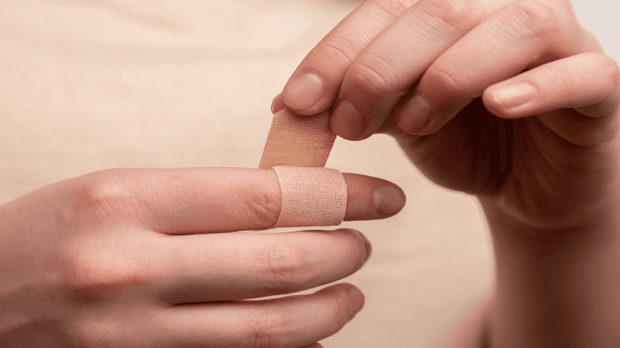 Wrapping Bandaid On Finger 900x506